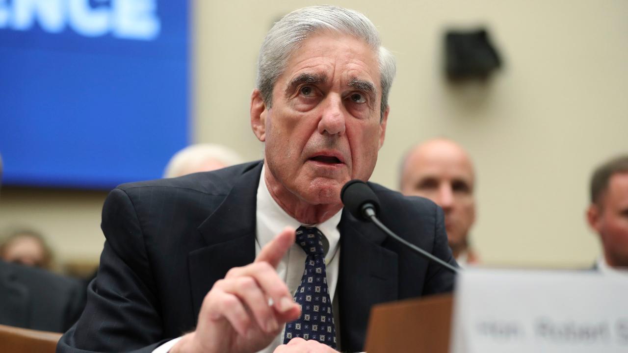 Mueller corrects testimony, says his probe did not reach determination as to whether Trump committed a crime