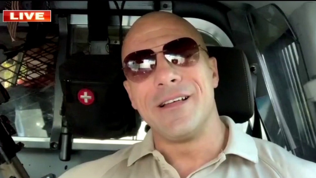Police officer reacts to going viral as Dwayne 'The Rock' Johnson lookalike
