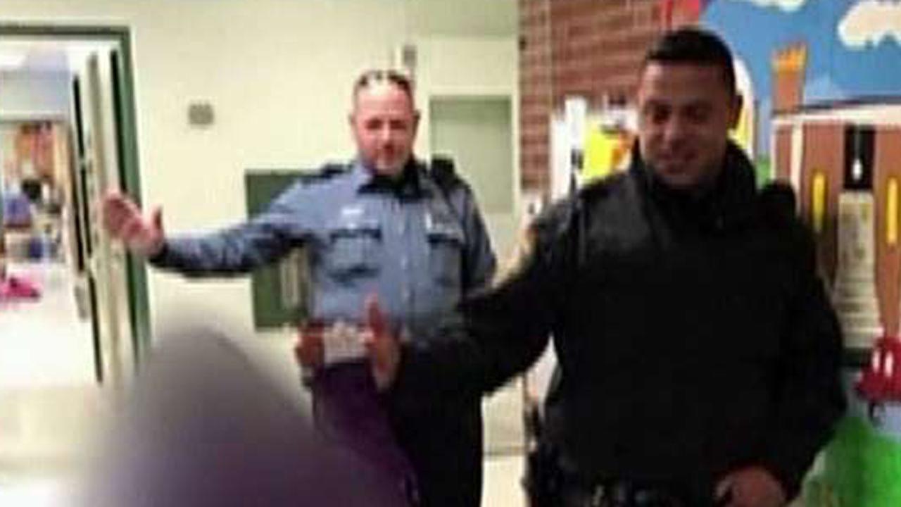 Police forced to end 'high five Friday' at children's school