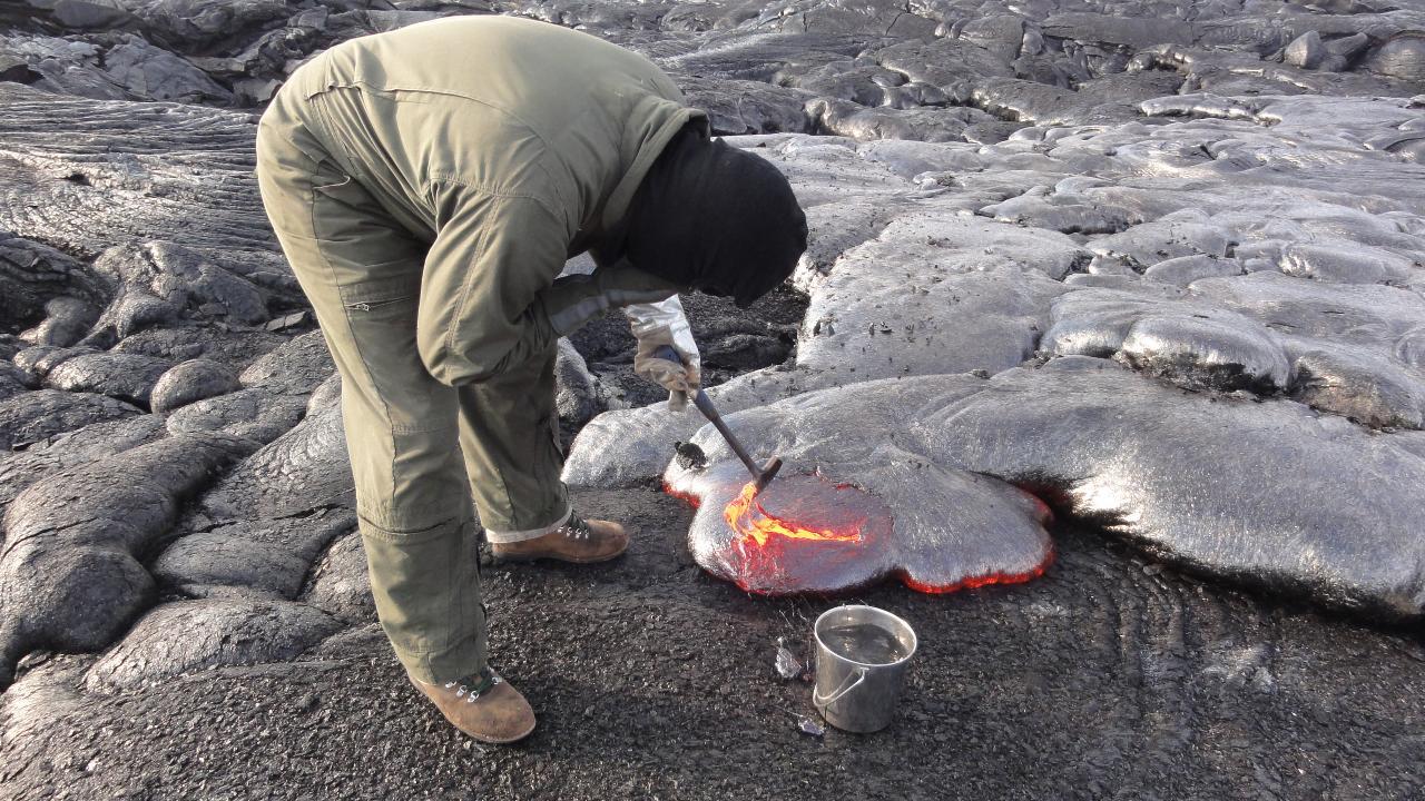 Scientists collect lava samples from live volcanoes