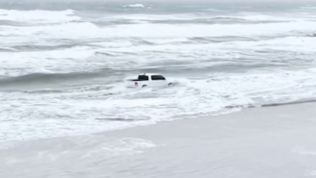 New York man drives truck into ocean at popular Florida beach
