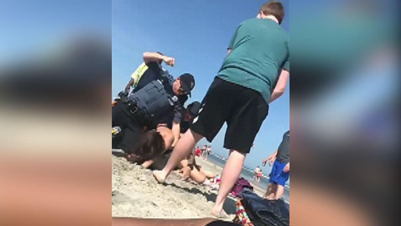 New Jersey officers fight woman at Wildwood beach