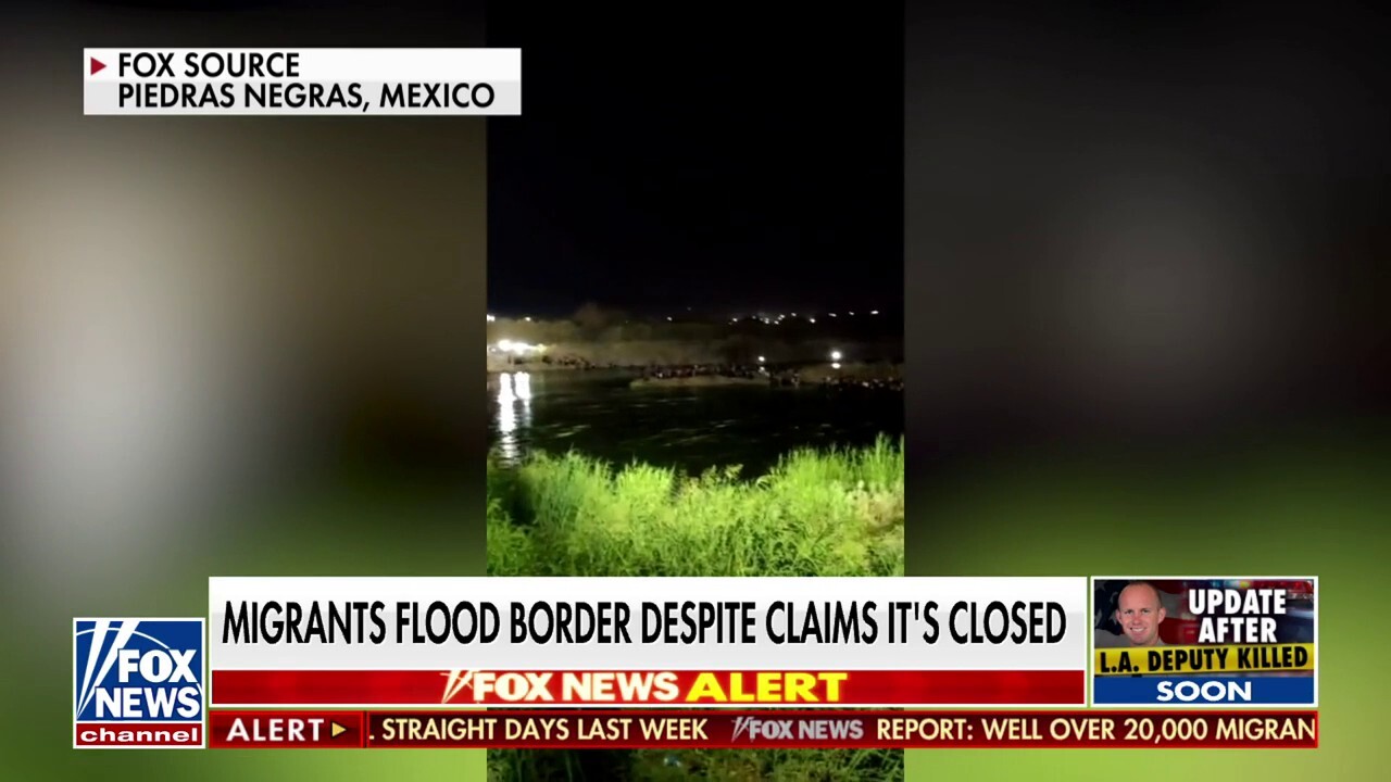 Video shows 2,500 migrants illegally crossing US border
