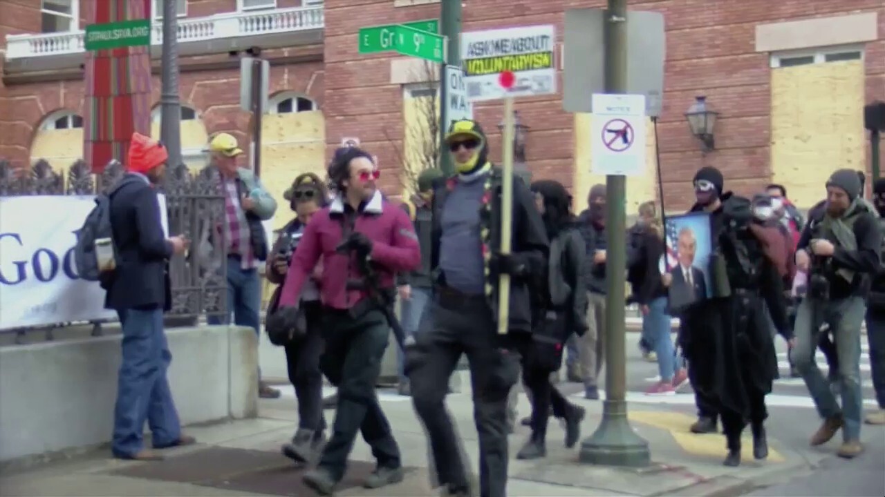 Gun rights advocates rally in downtown Richmond, Va.