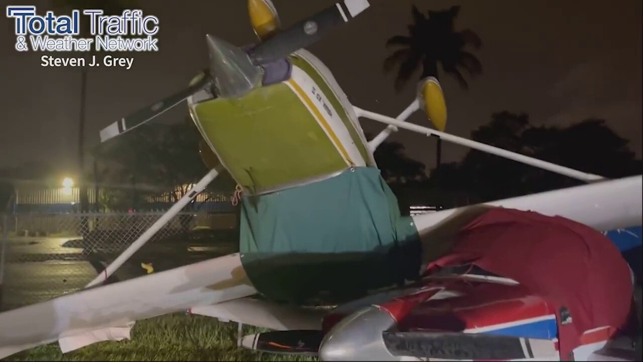 Planes at Florida's North Perry Airport are overturned and destroyed during Hurricane Ian