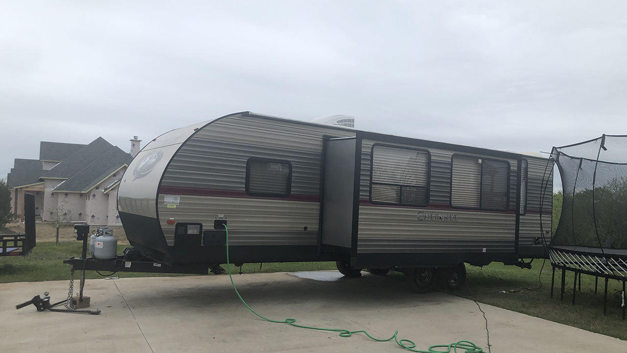 Volunteers work to place medical personnel in mobile homes for self-isolation