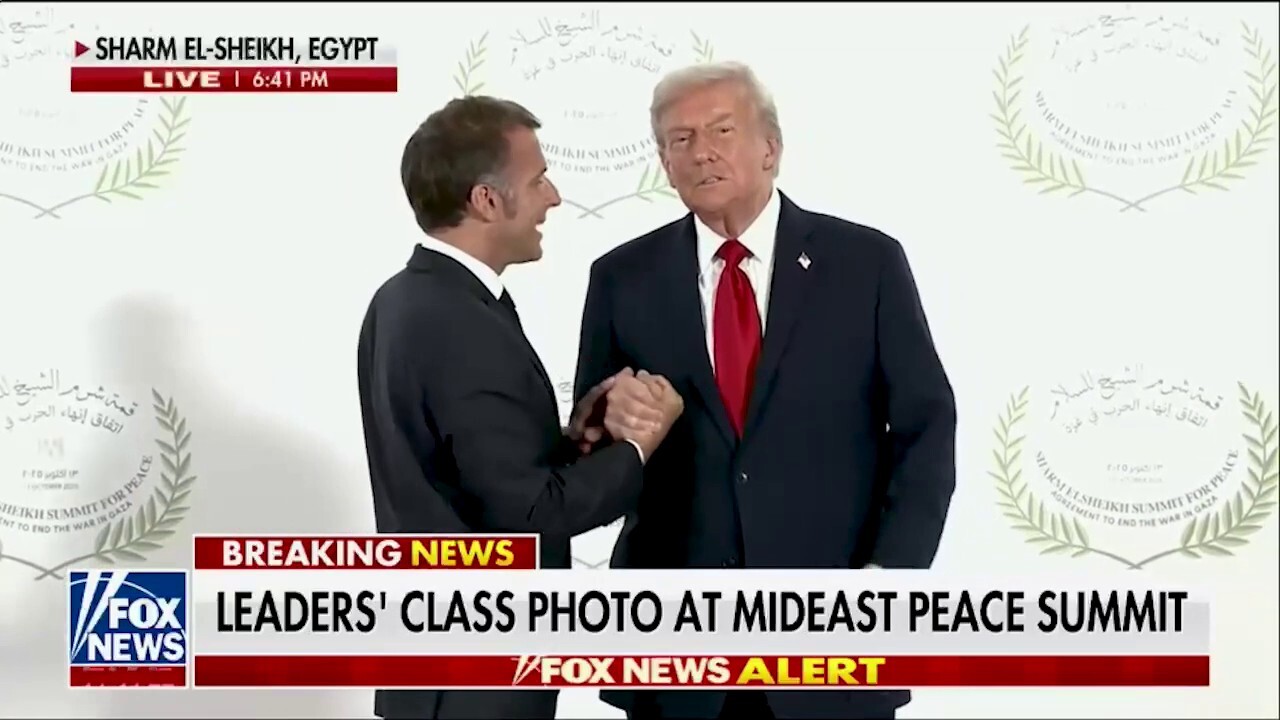 U.S. President Donald Trump and French President Emmanuel Macron share long, awkward handshake