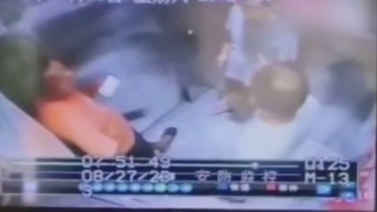 Elevator suddenly takes plunge in China, injuring three people