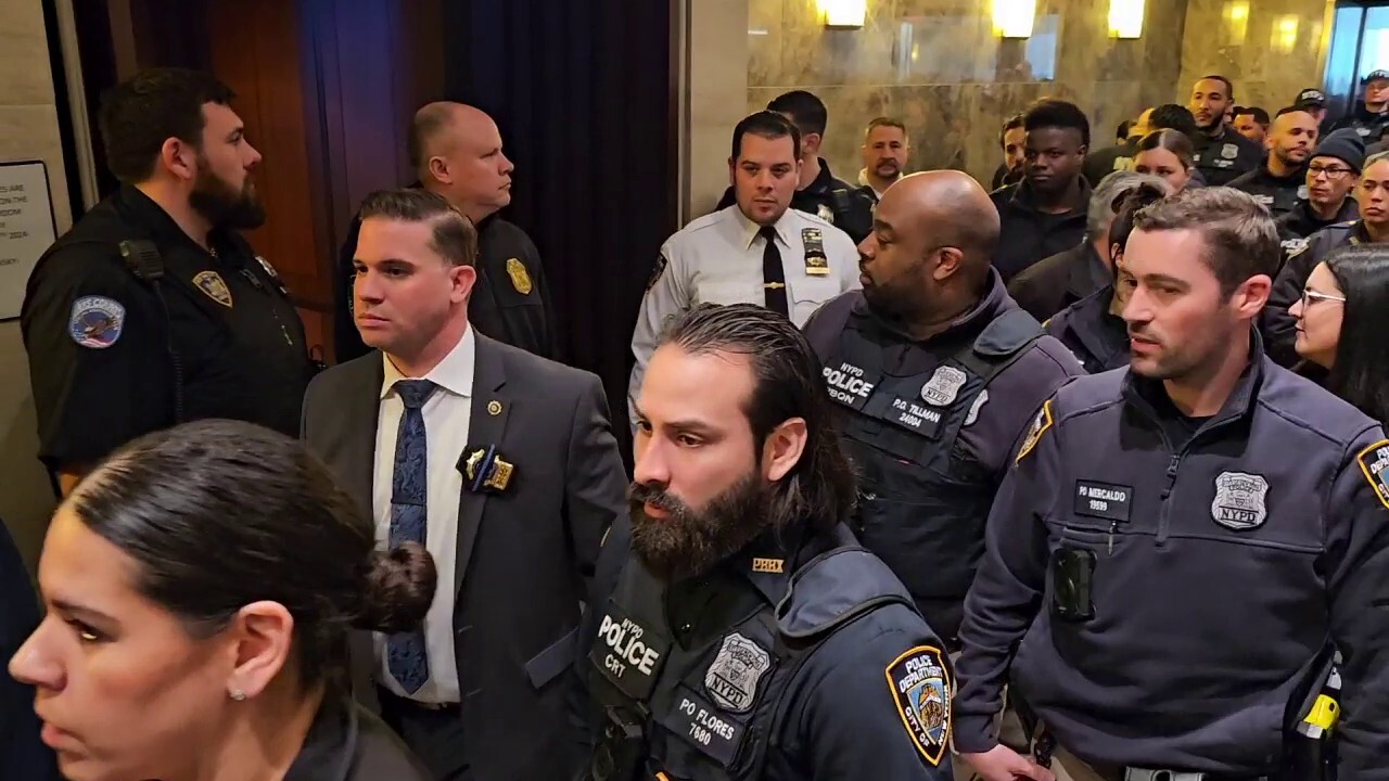 NYPD officers show up in court for suspect in cop slaying