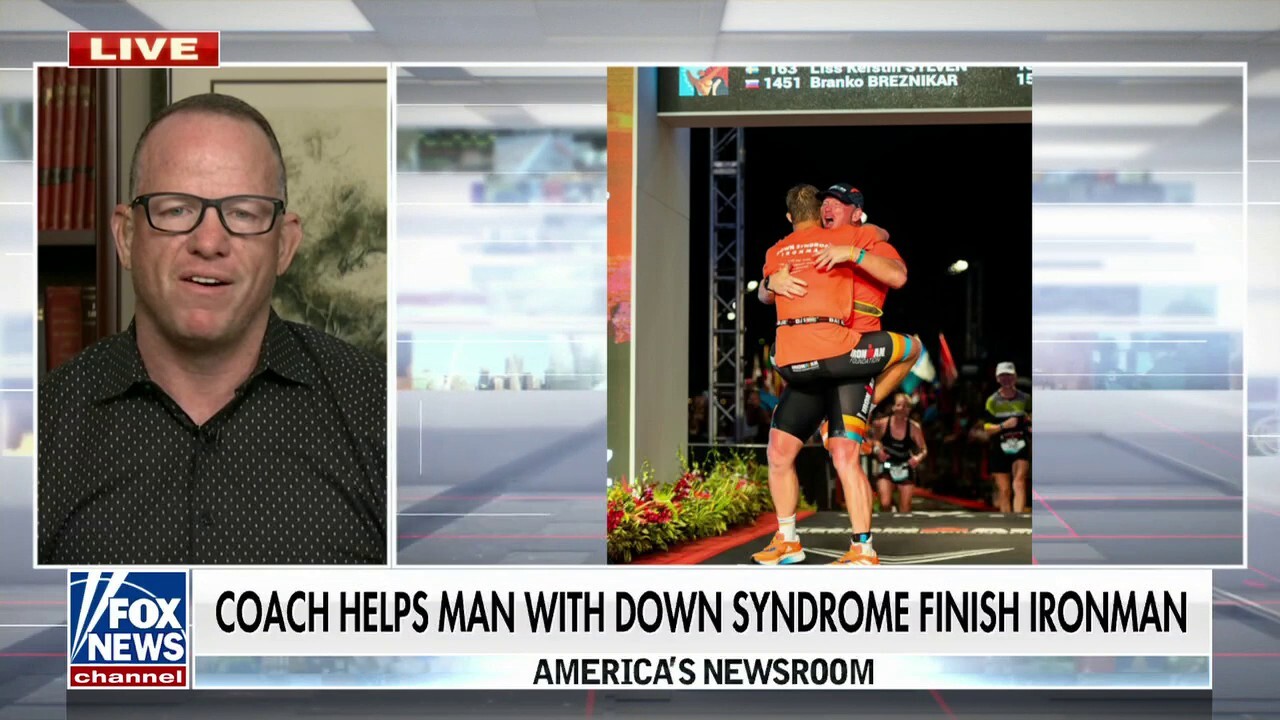 Coach helps man with Down syndrome complete Iron Man competition