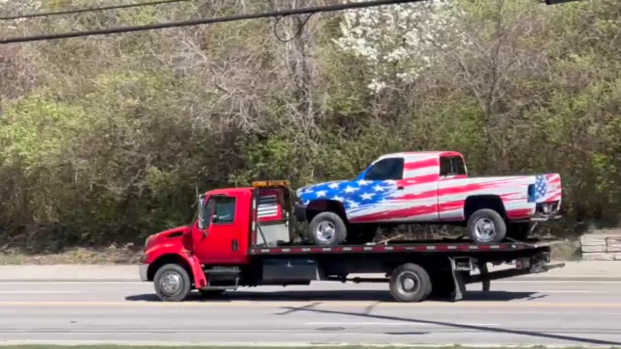 Patriotic high schoolers' new American flag paint wrap driven off the lot for the first time