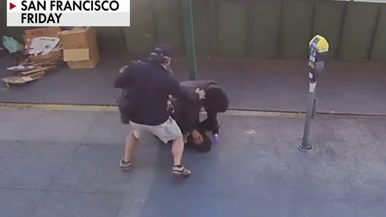 San Francisco police officer fends off attacker with help from bystander