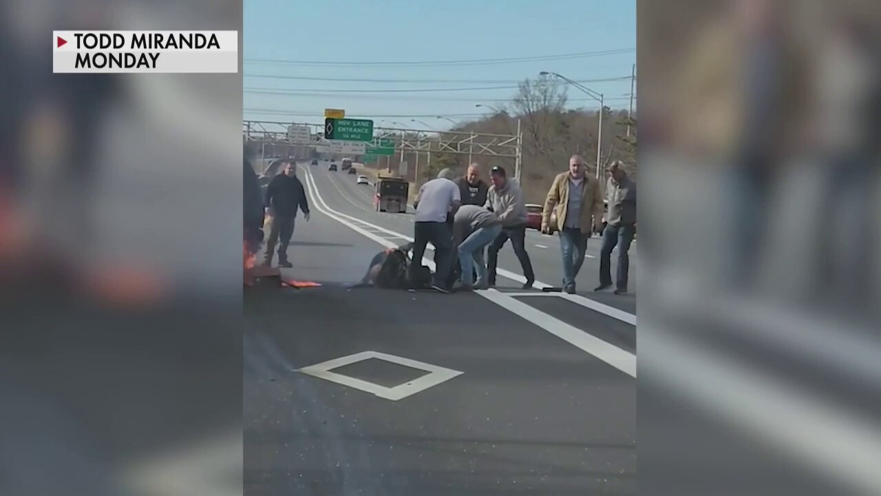 Good Samaritans in New York save woman from burning car along highway