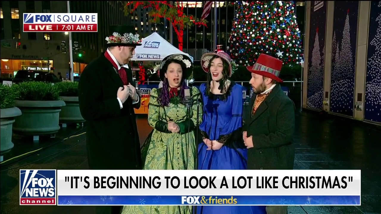 The Christmas Carolers sing 'It's Beginning to Look a Lot Like Christmas'