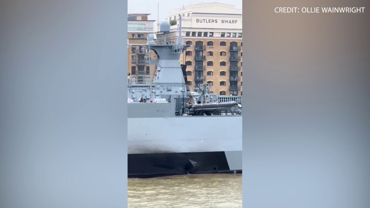 German warship cruises on river blasting Darth Vader theme