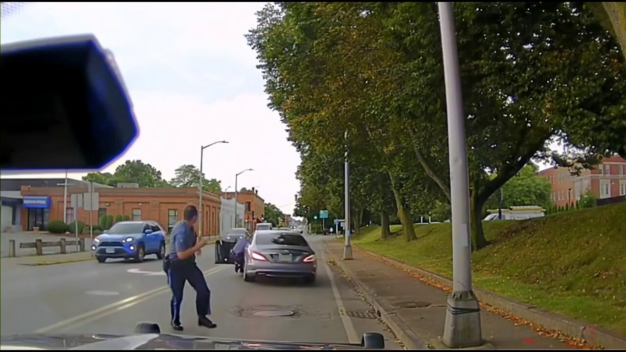 Massachusetts State Trooper seen on video being dragged during traffic stop