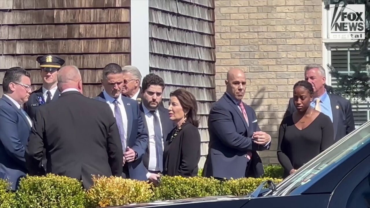 New York Gov Kathy Hochul is seen at the wake for slain NYPD officer Jonathan Diller 