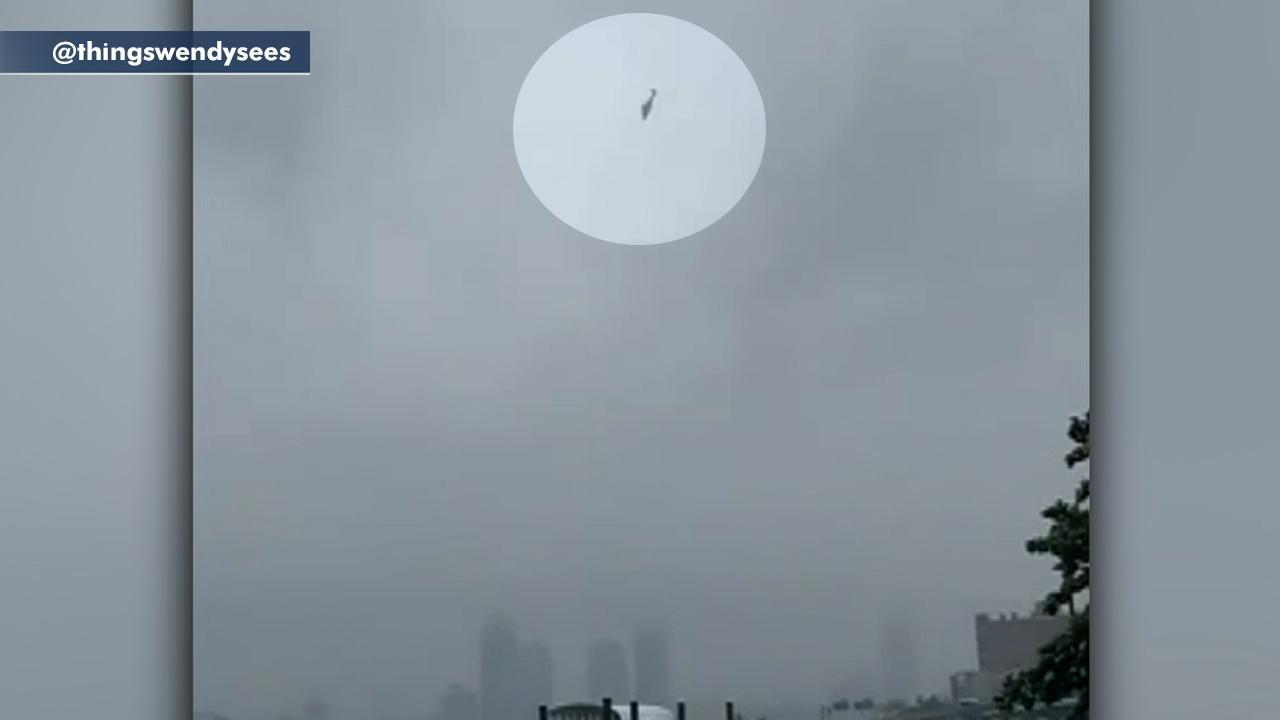 Helicopter seen flying erratically over the East River in New York City