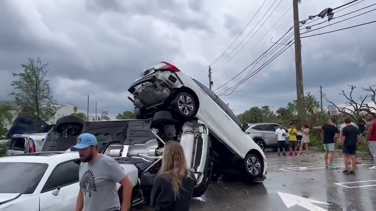 Video shows vehicles in pile after tornado hits Palm Beach Gardens, Florida