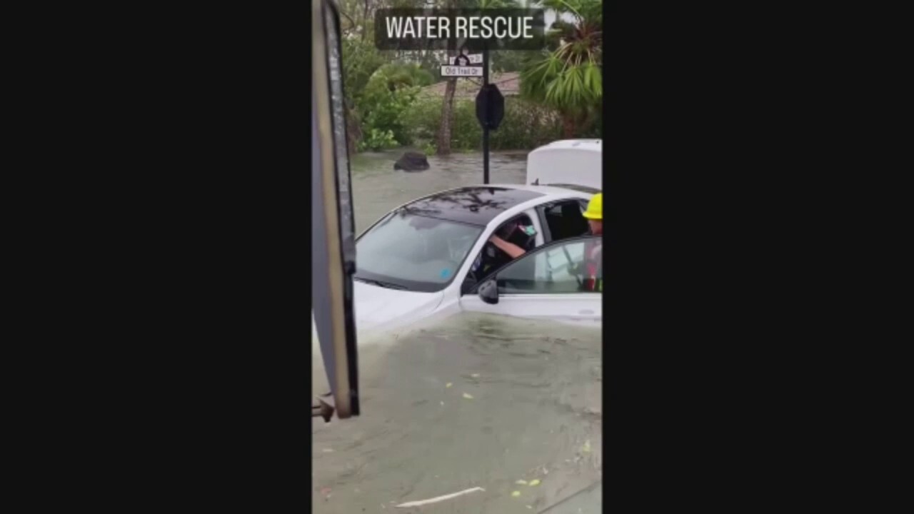 Hurricane Ian: Naples, Florida fire department rescues woman from car