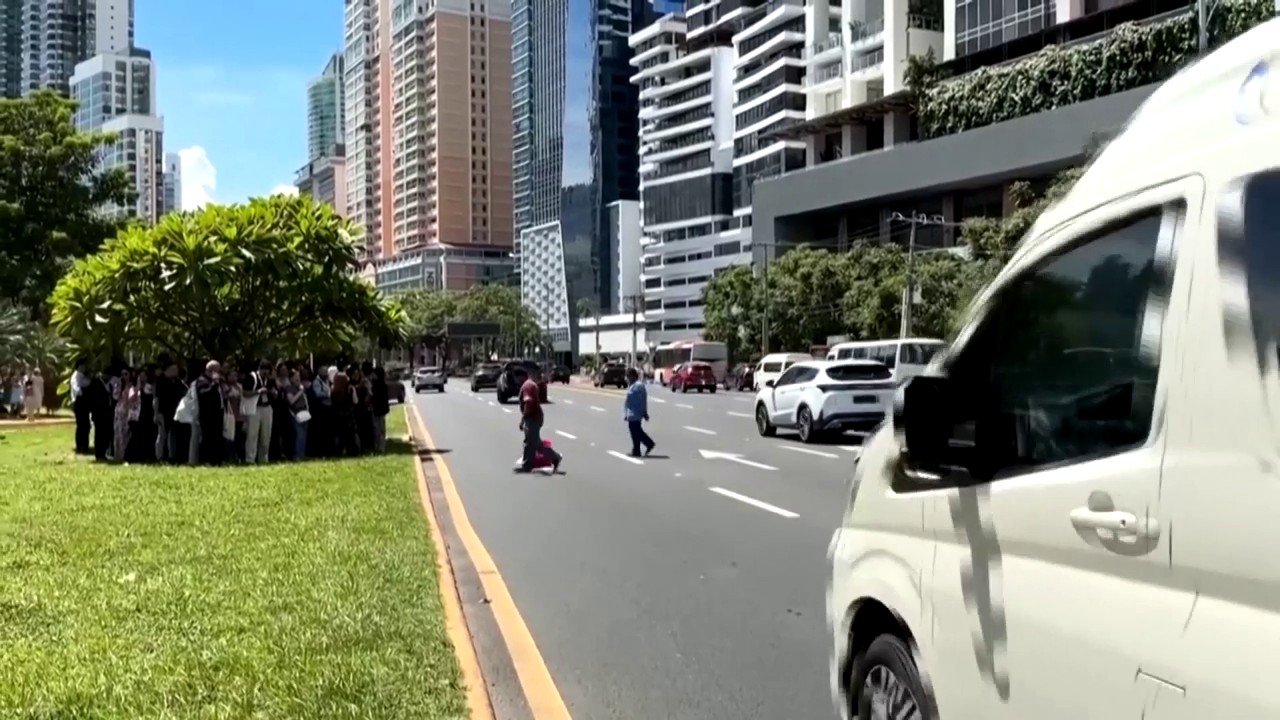Workers evacuate buildings in Panama City after powerful earthquake