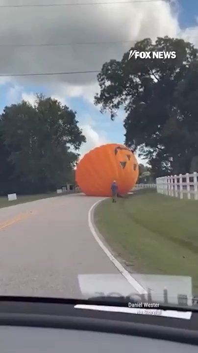 Giant inflatable pumpkin terrorizes North Carolina road