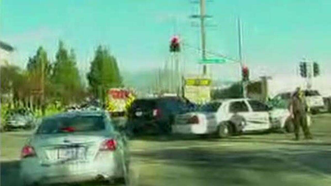 Law enforcement officers swarm SUV in San Bernardino, CA