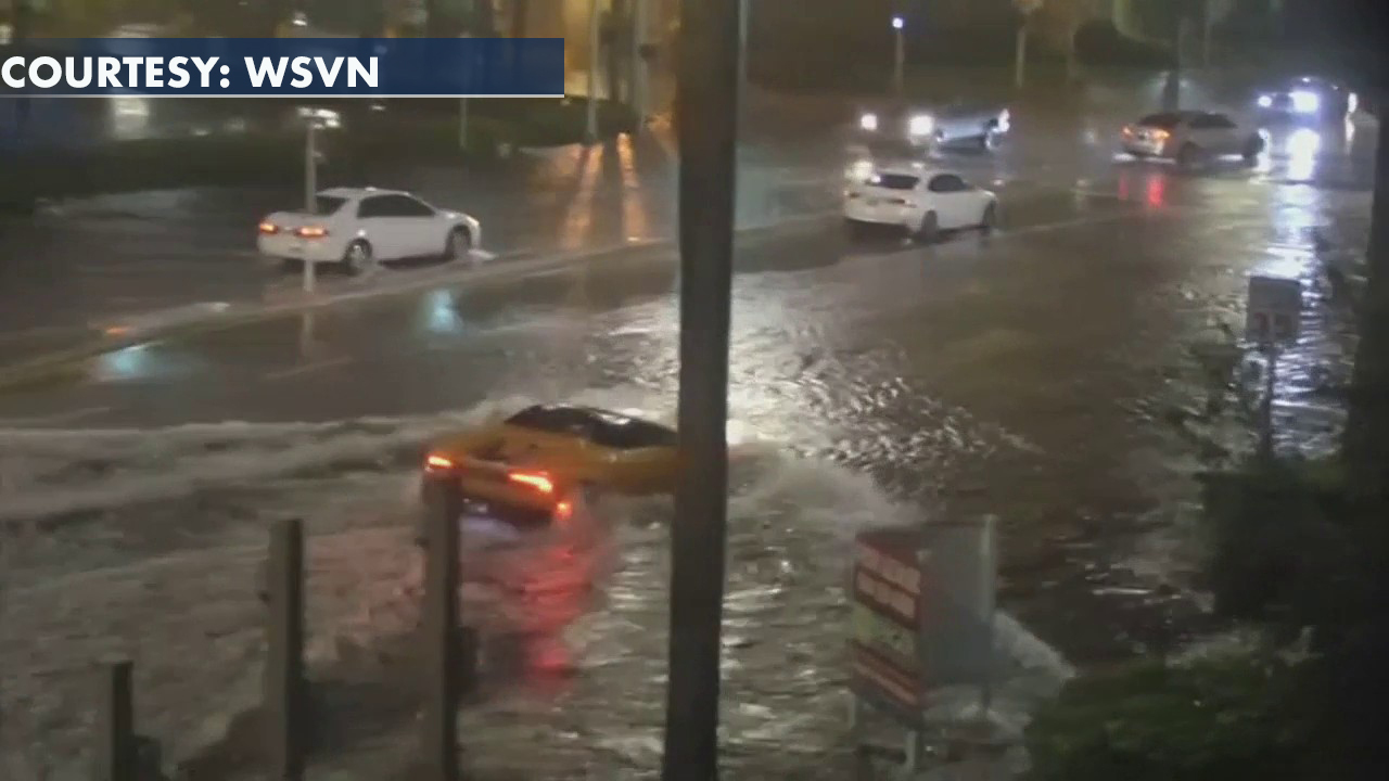 Lamborghini drives through floodwaters in Miami