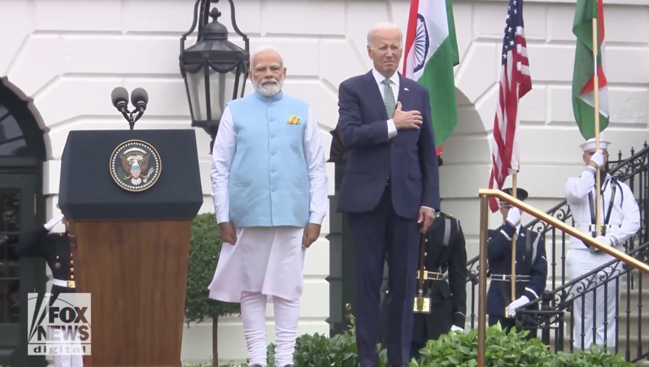 Biden slowly lowers hand from heart during playing of Indian national anthem