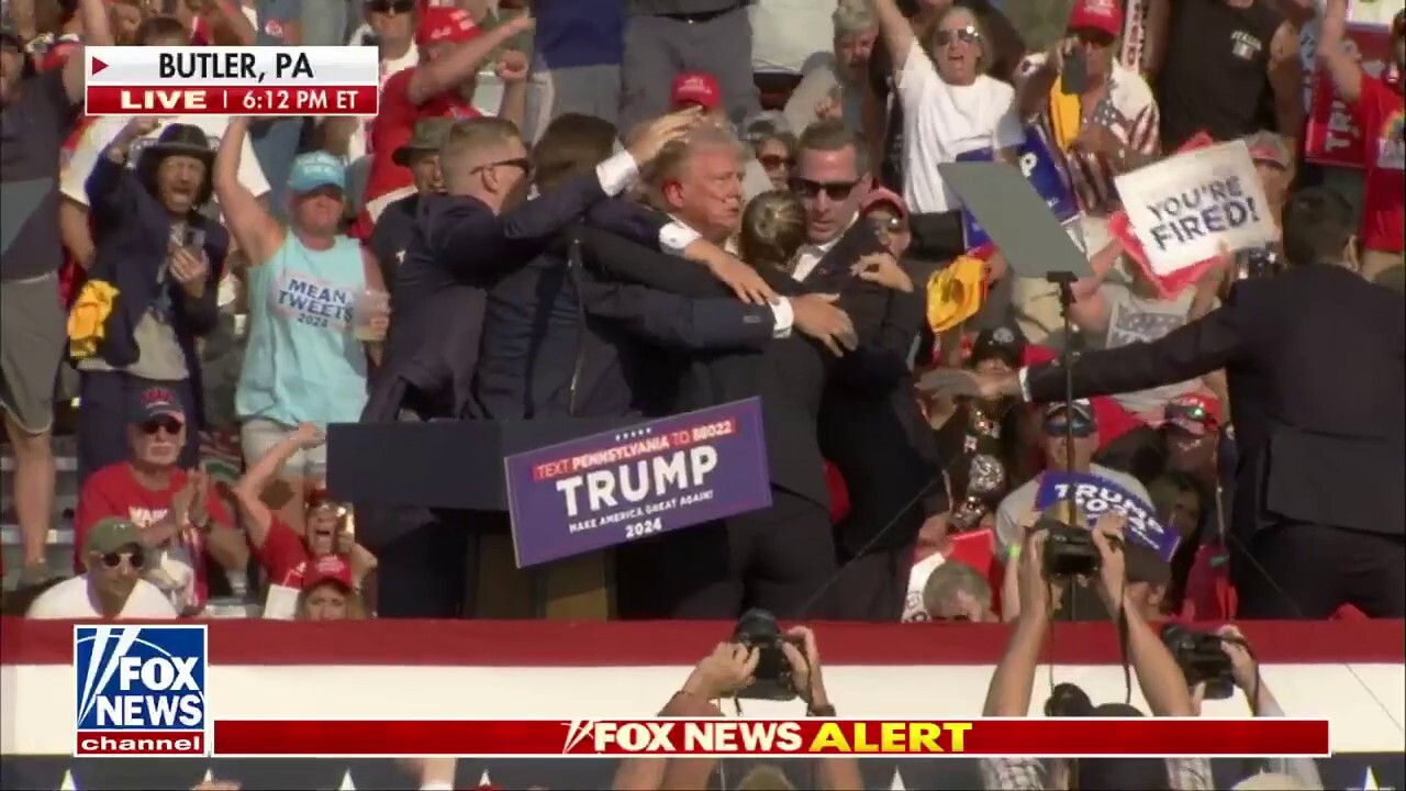 Trump led off stage after '4 or 5 shots' heard at rally