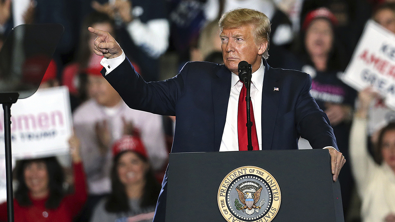 Trump slams impeachment trial at New Jersey rally 