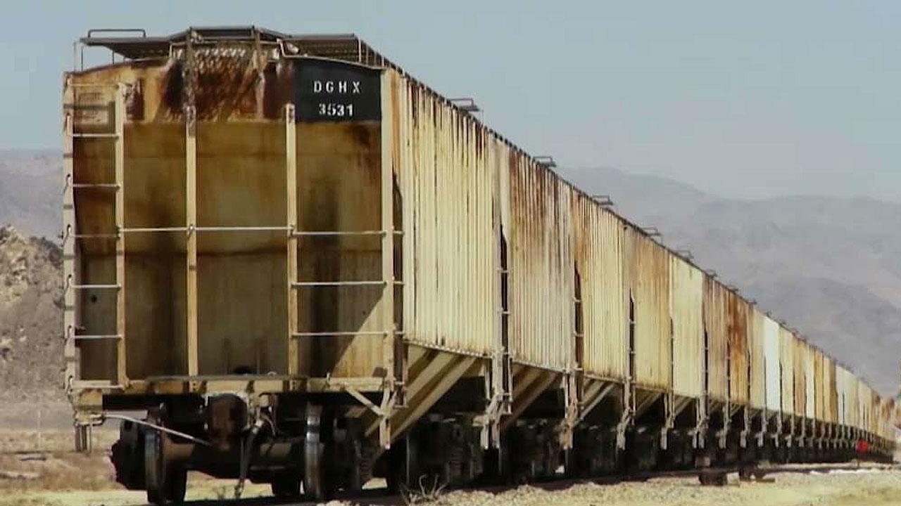 Buried boxcars add unique living space to Arizona property