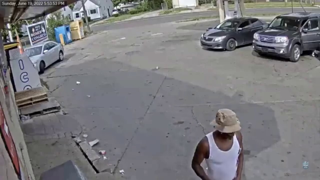Detroit suspect draws gun on man carrying baby at gas station