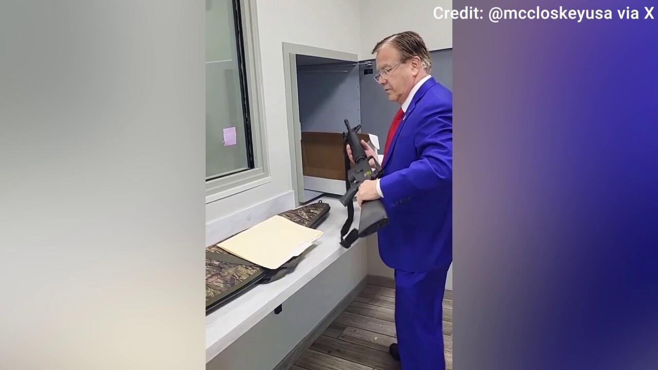 Mark McCloskey picks up his AR-15 from the police department