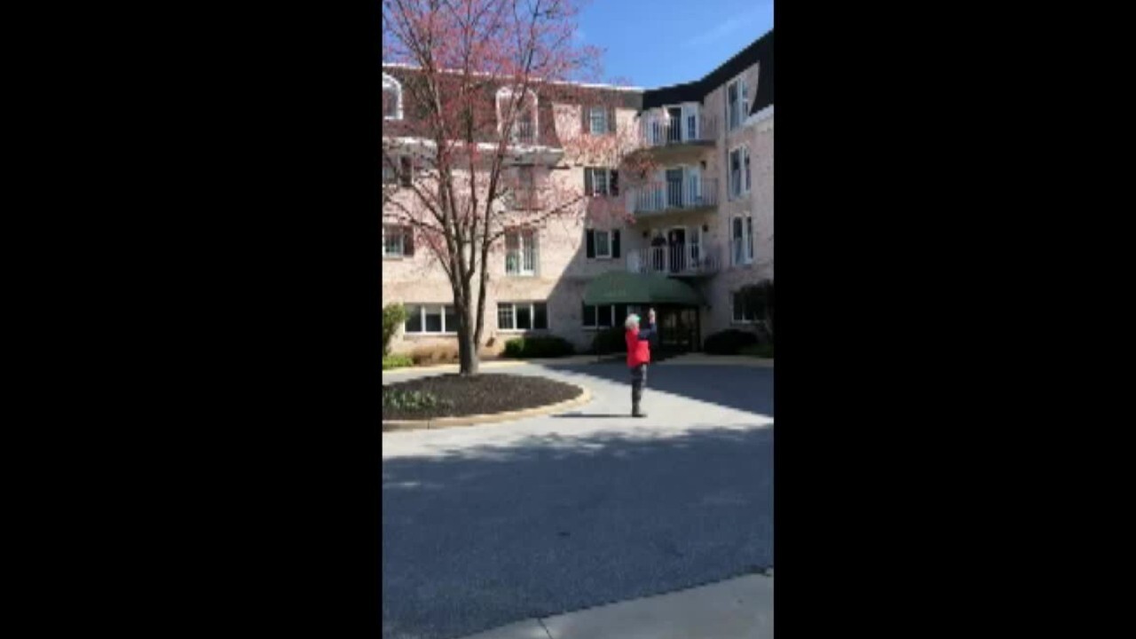 Pennsylvania retirement community stays positive by singing 'God Bless America' from their balconies