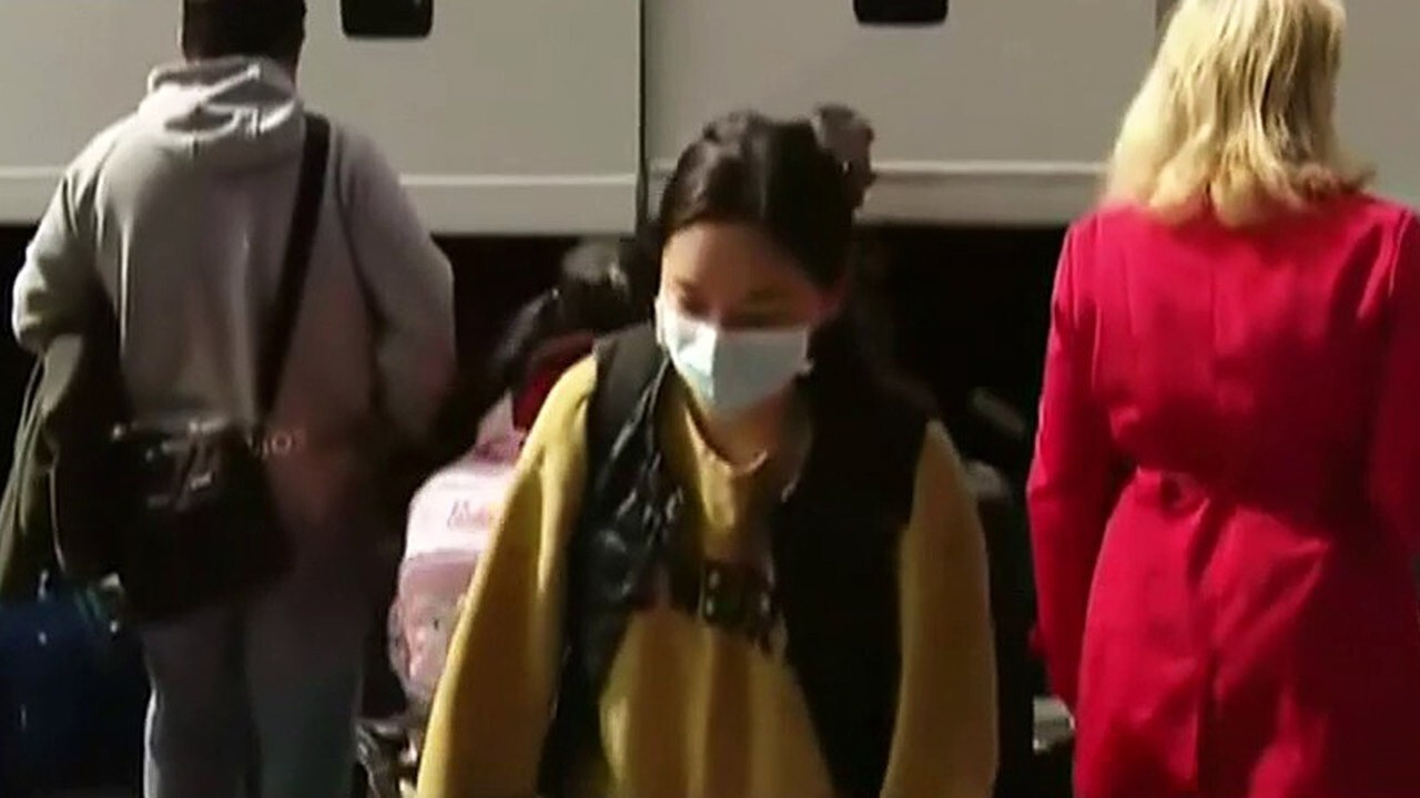 Passengers disembark cruise ship in Japan after 14-day coronavirus quarantine