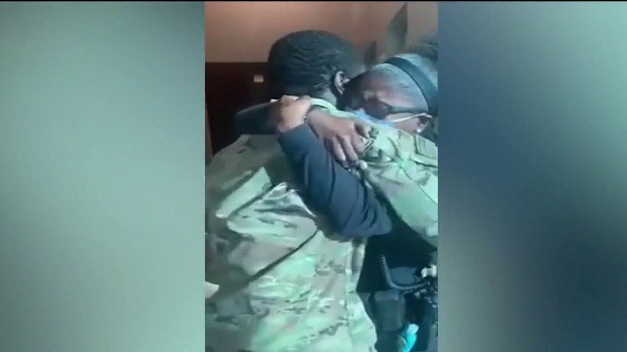 Military boy comes home to surprise police sergeant mother for holiday