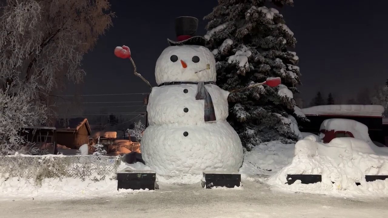 Let it snow! Alaska residents build 20-foot snowman for the first time in 10 years