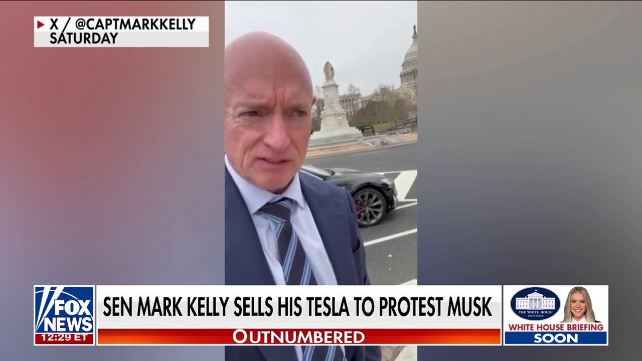 Sen. Mark Kelly called out for swapping his Tesla for a Chevy Tahoe ...