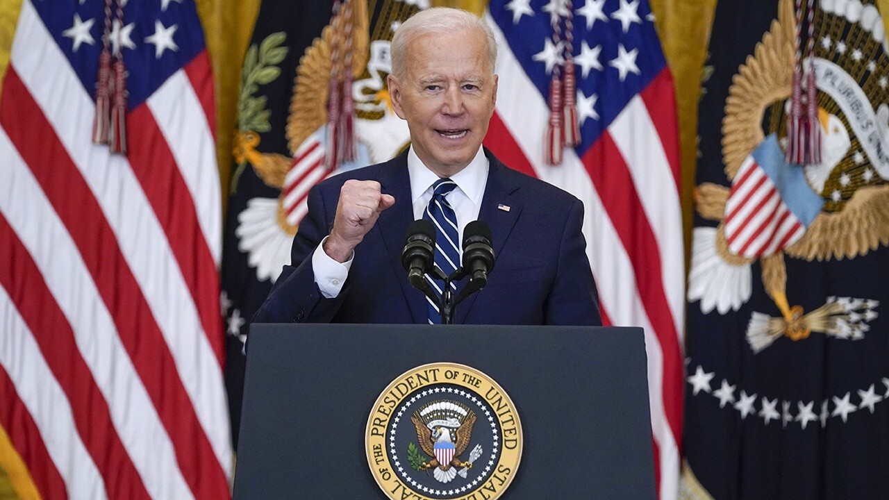 Biden uses 'cheat sheet' at first news conference