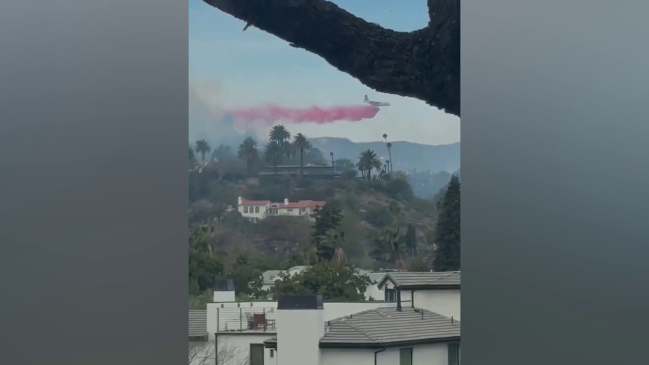 Planes fight massive California infernos