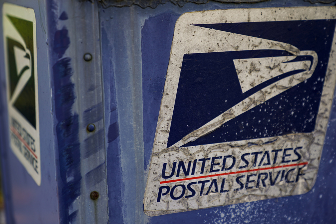 USPS delays cost-cutting changes that sparked concerns about election mail delays
