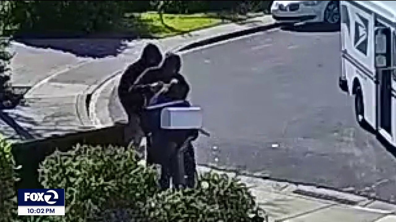 California postal worker robbed by masked assailants in attack caught on surveillance video
