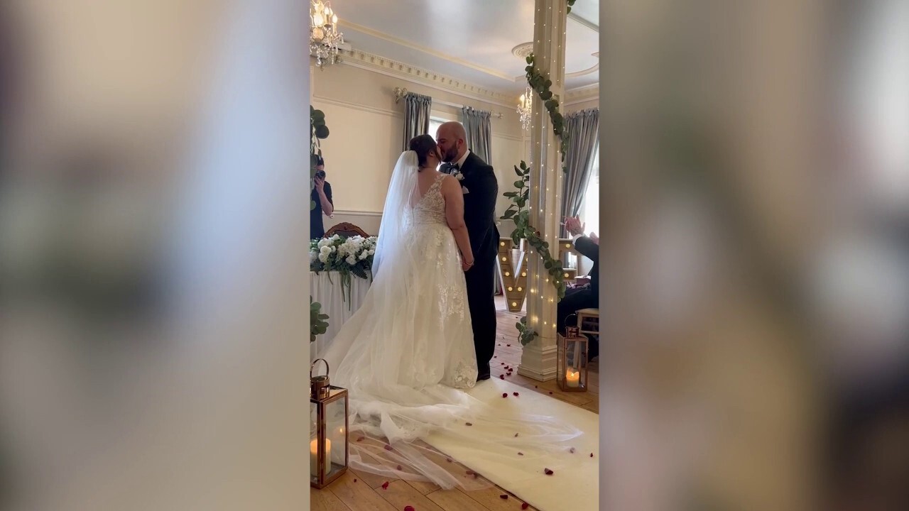 Bride falls at wedding reception, hurting her foot and missing her honeymoon