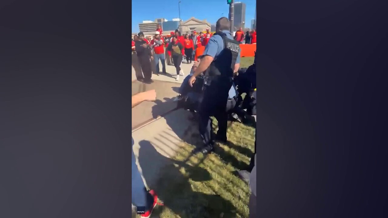Bystanders at the Kansas City Chiefs parade tackle man they suspect is a shooter