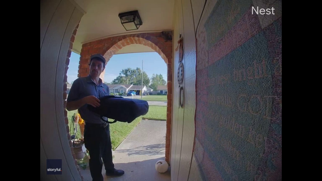 Watch this squirrel launch itself through a family's front door as pizza delivery arrives