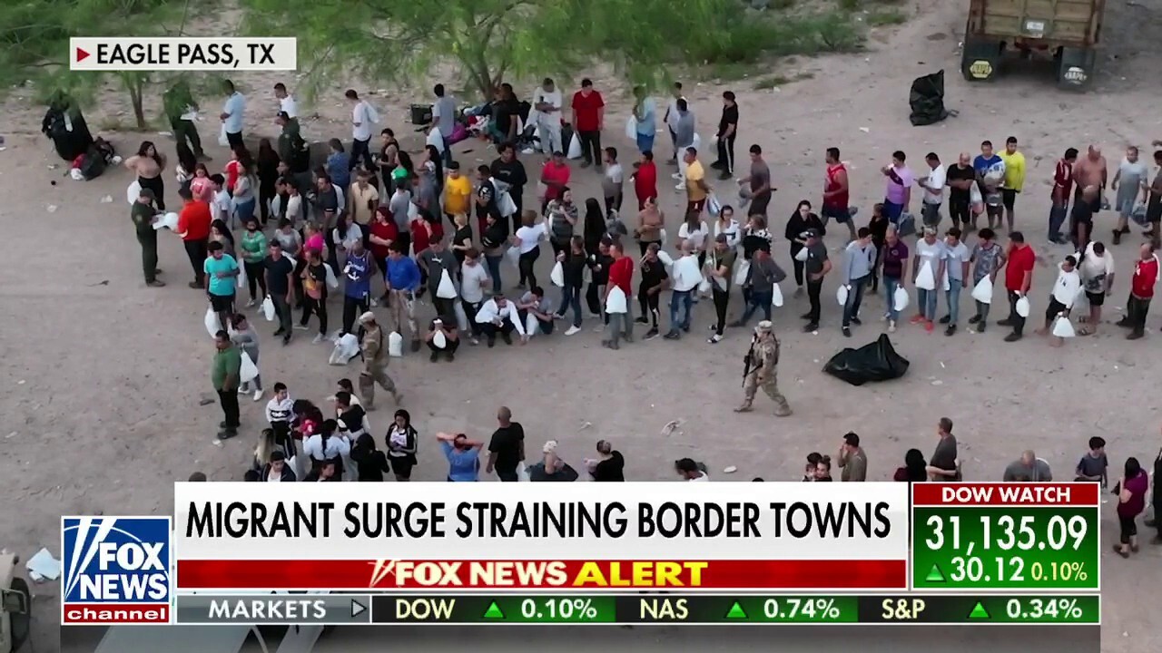 Border Patrol facilities reach capacity as migrants camp outside