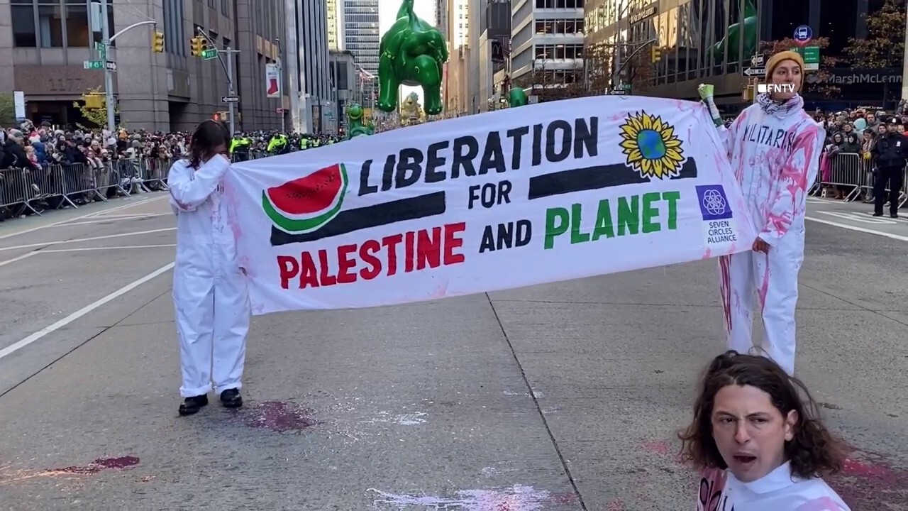 Pro-Palestinian protesters disrupt Macy's Thanksgiving Day Parade 