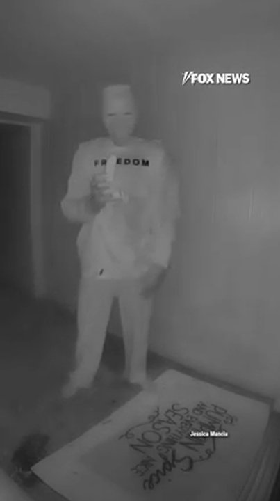 WATCH: Creep in Biden mask, Kirk shirt eats banana outside on family's doorstep
