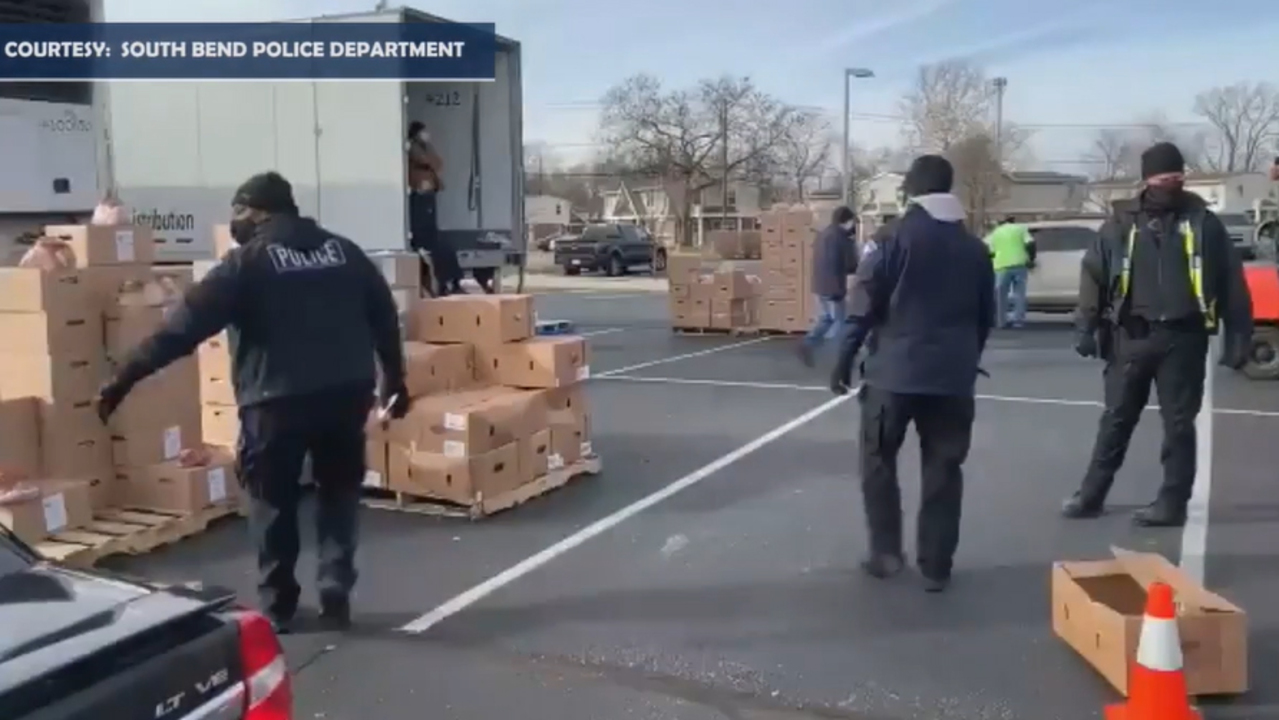 South Bend Police help distribute Salvation Army food, toy boxes 